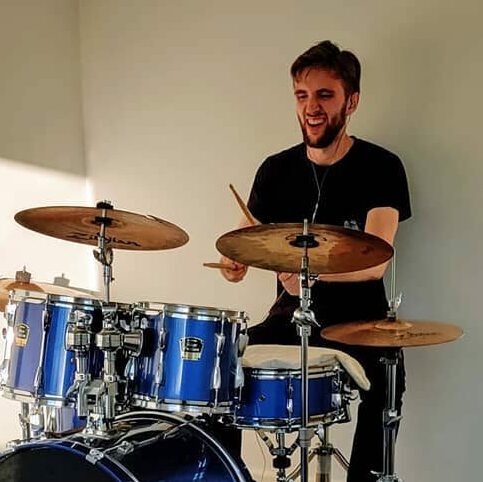 Kell Hallman playing drums